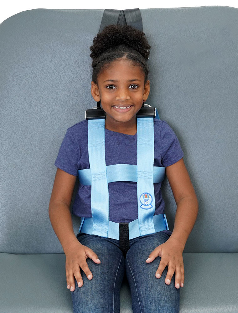 Child safely seated on bus